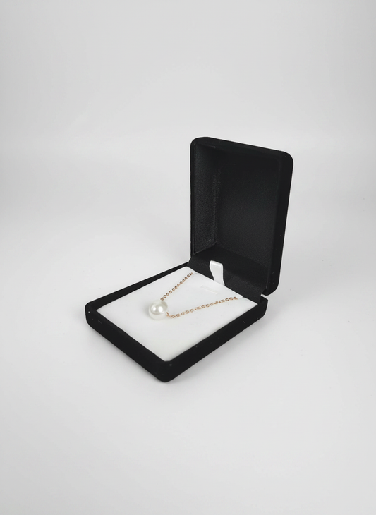 Écrin nuptial velours noir et blanc avec collier